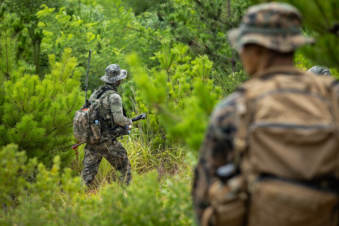A Republic of Korea Marine advances towards simulated enemy positions during the Korean Marine Exercise Program 25.2 in Pohang, South Korea, August 5, 2025. KMEP is conducted regularly between the ROK and U.S. Marine Corps to increase their combined capabilities through realistic training geared towards deterrence and maintaining peace in the Indo-Pacific. (U.S. Marine Corps photo by Lance Cpl. Van Hoang)
