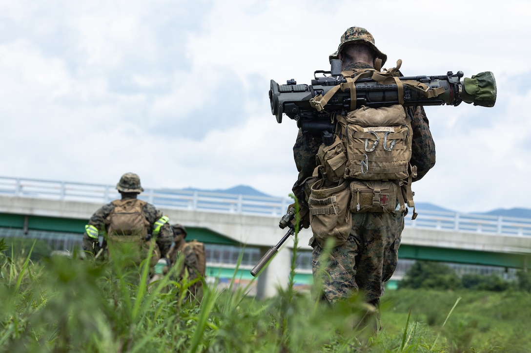 U.S. Marine Corps Cpl. Cole Morrison, a Multi-role, Anti-armor Anti-personnel Weapon System gunner with 2nd Battalion, 23rd Marines, forward deployed with 4th Marine Regiment, 3d Marine Division as part of the Unit Deployment Program, patrols with his fireteam toward a support by fire position during the Korean Marine Exercise Program 25.2 in Pohang, South Korea, August 5, 2025. KMEP is conducted regularly between the ROK and U.S. Marine Corps to increase their combined capabilities through realistic training geared towards deterrence and maintaining peace in the Indo-Pacific. (U.S. Marine Corps photo by Lance Cpl. Van Hoang)