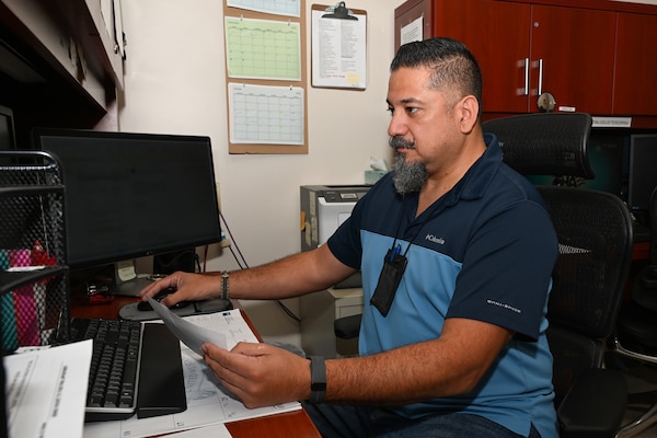 250818-N-FM959-1012 Jacksonville, FL. (August 18, 2025) Mike Aguilar, lead hearing conservation technician at audiology at Naval Branch Health Clinic (NBHC) Jacksonville, inputs patient information into the defense occupation and environmental health readiness system. The audiology staff at NBHC Jacksonville received the Best of the Best Award from the Defense Health Network Atlantic’s Joint Patient Survey for Quarter 2, Fiscal Year 2025, with 100 percent beneficiary satisfaction. (U.S. Navy photo by Michael Campbell)