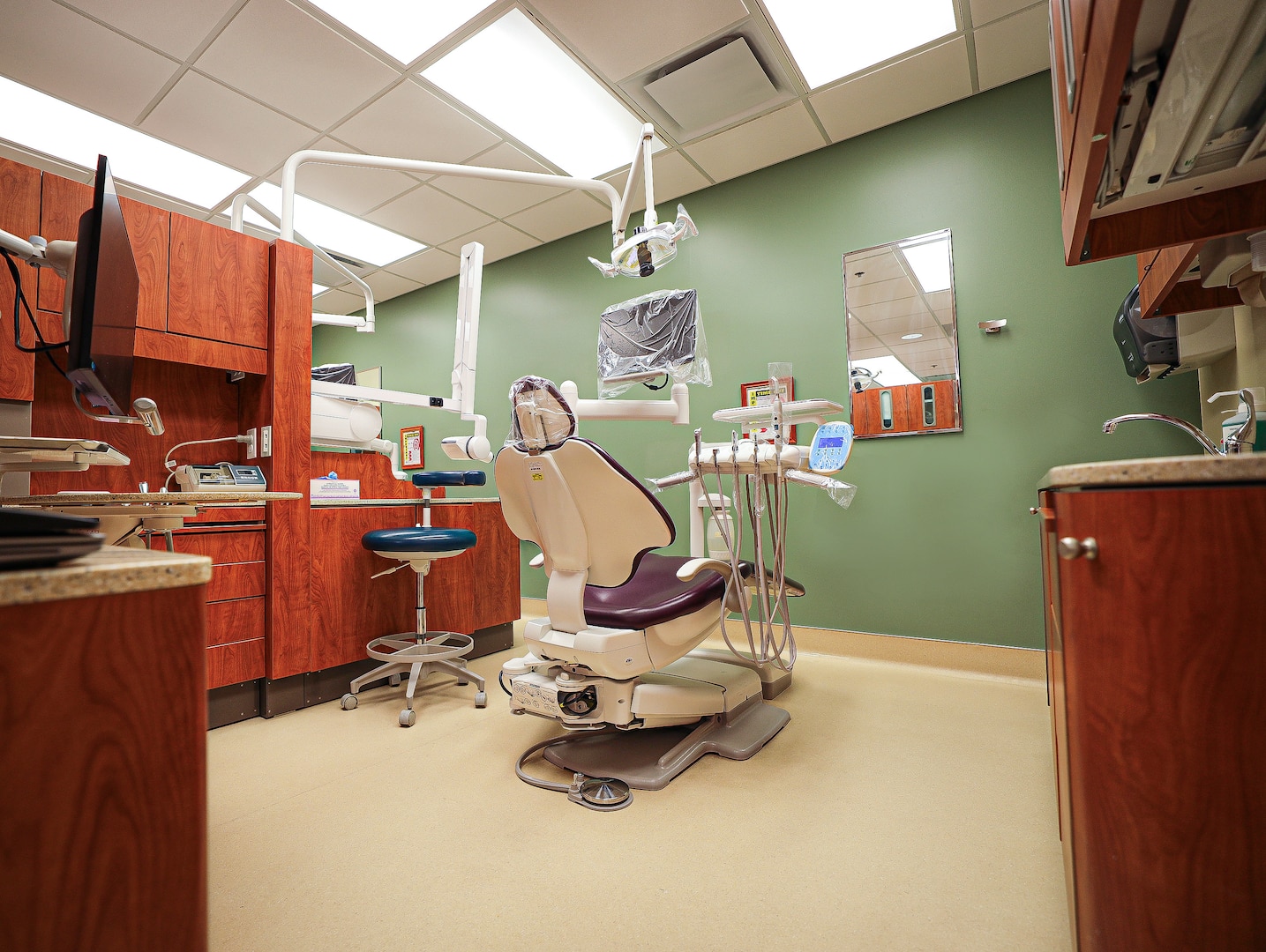 A fully prepared general dentistry operatory at Custer Hill Dental Clinic, complete with infection control barriers, stands ready to deliver safe, high-quality care to Soldiers.