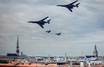 jets flying over a city