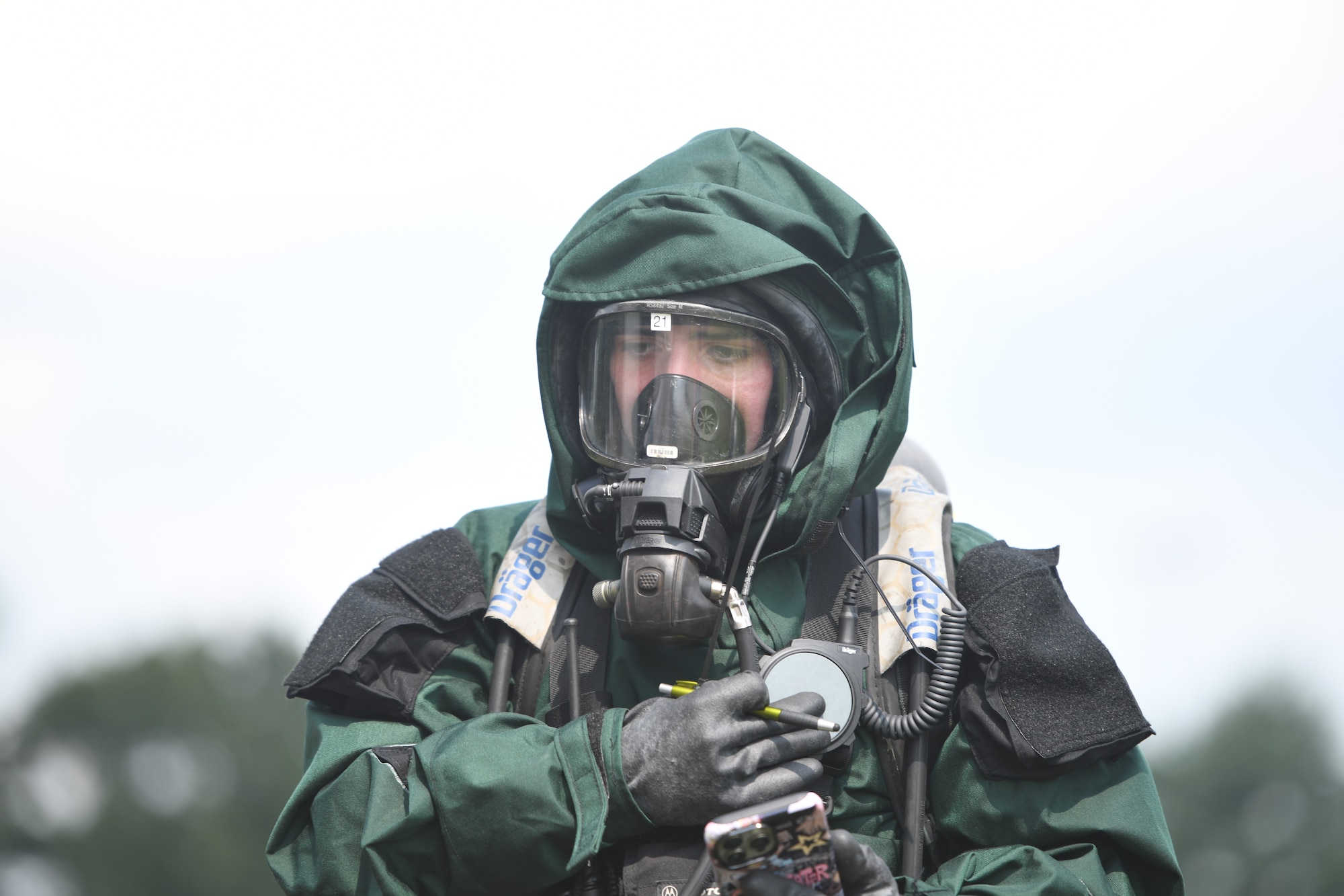U.S. Army Spc. Andrew DeJesus, member of the New Jersey National Guard’s 21st Weapons of Mass Destruction–Civil Support Team, communicates with his team over the radio during a joint training exercise at Mercer County Park, West Windsor Township, New Jersey, July 31, 2025.