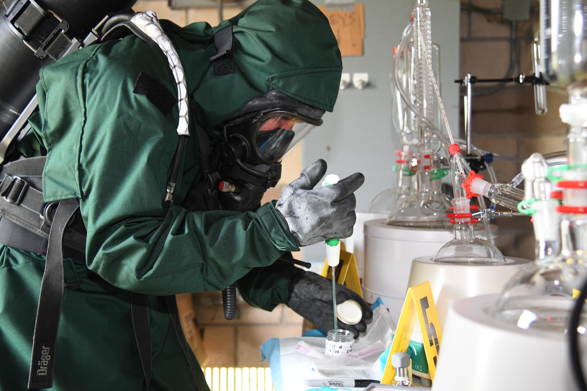 U.S. Army Spc. DeJesus, member of the New Jersey National Guard’s 21st Weapons of Mass Destruction–Civil Support Team, uses a pipette to transfer a liquid sample during a training exercise at Mercer County Park, West Windsor Township, New Jersey, July 31, 2025.