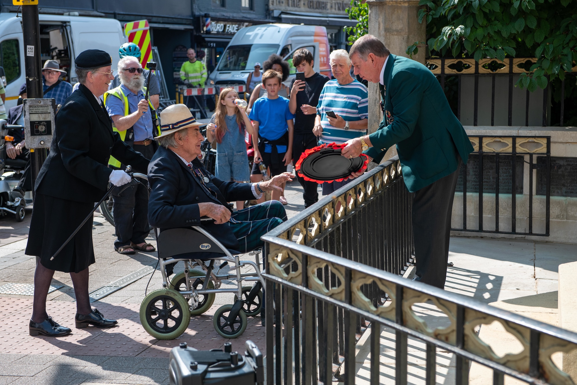 A veteran prepares to lay a wreath during the 80th anniversary Victory over Japan Day ceremony