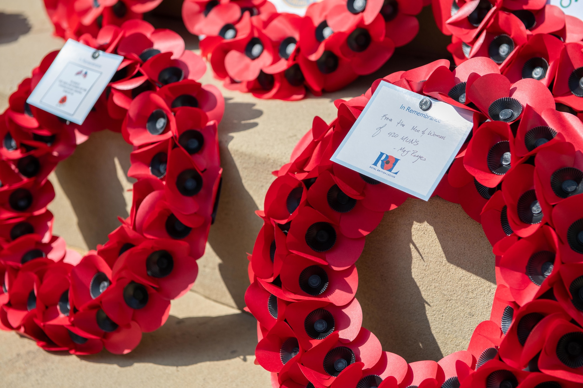 Wreaths rest at the base of the Newbury War Memorial