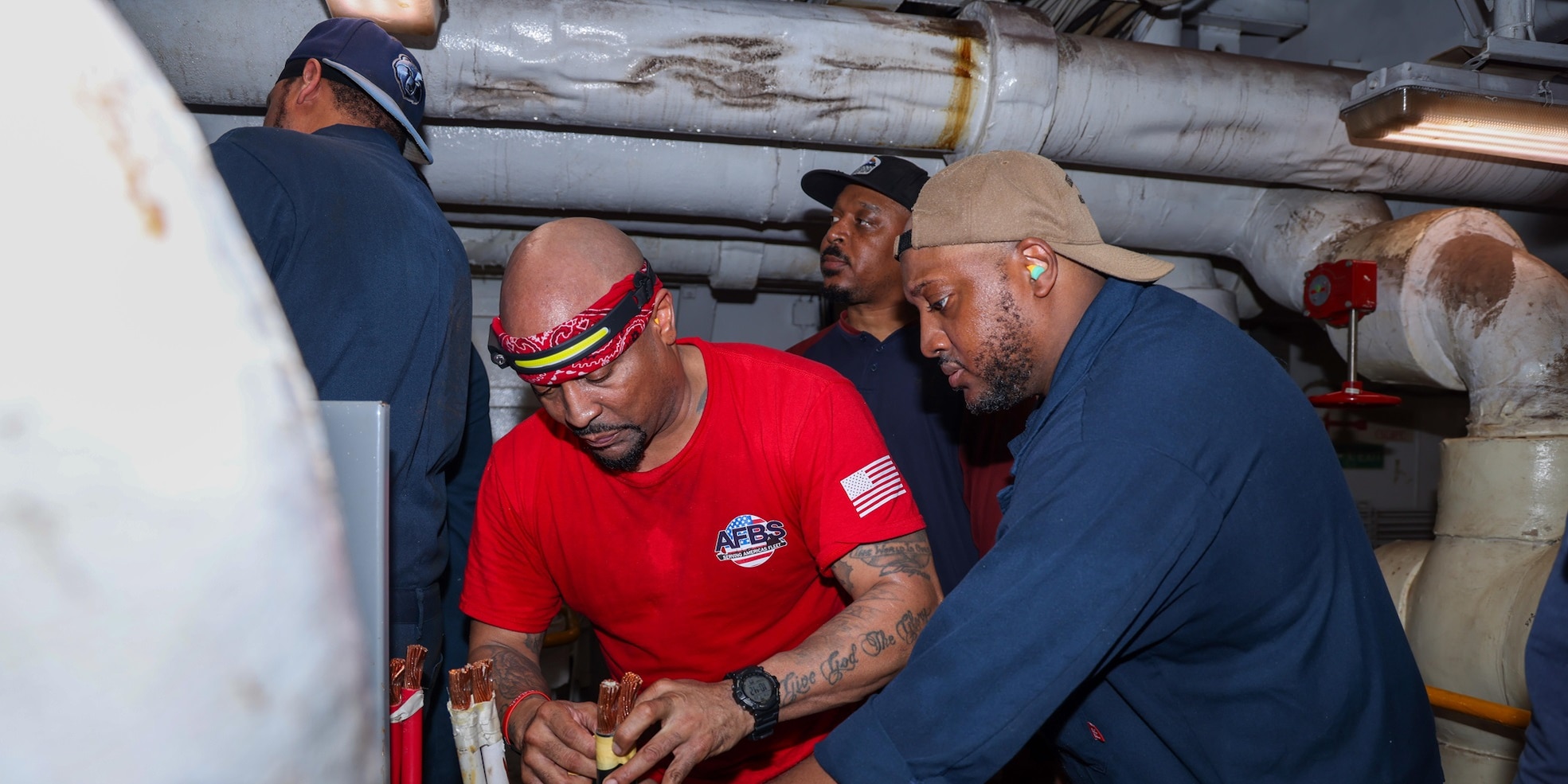Civilian Mariners assigned to Military Sealift Command aboard the Mercy-class hospital ship USNS Comfort (T-AH 20) perform maintenance on the air conditioning system during Continuing Promise 2025, July 23, 2025. Continuing Promise 2025 is the 16th iteration of the U.S. 4th Fleet/U.S. Naval Forces Southern Command-led mission since 2007, which aims to foster goodwill, strengthen existing partnerships with partner nations, and form new partnerships between host nations, non-federal entities, and international organizations.