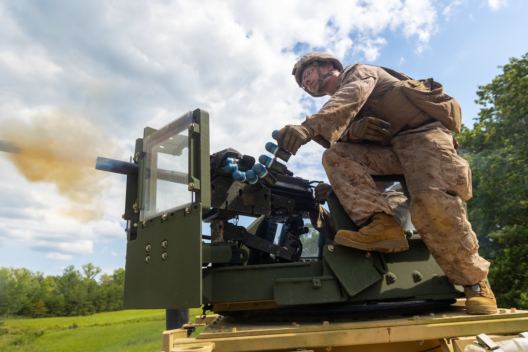 U.S. Marine Corps Cpl. Darian Zambron, a logistics specialist with Combat Logistics Battalion 22, Combat Logistics Regiment 27, and native of Michigan, assists with operating a Mark 19 40 mm grenade machine gun during a deployment for training at Marine Corps Base Quantico, Virginia, Aug 2, 2025. The logistics combat element of the Special Purpose Marine Air-Ground Task Force – Alert Contingency MAGTF (SPMAGTF-ACM), CLB-22, conducted a deployment for training to increase proficiency in comprehensive combat service support and improve overall combat readiness for any potential MAGTF missions. (U.S. Marine Corps photo by Lance Cpl. Jack Labrador)