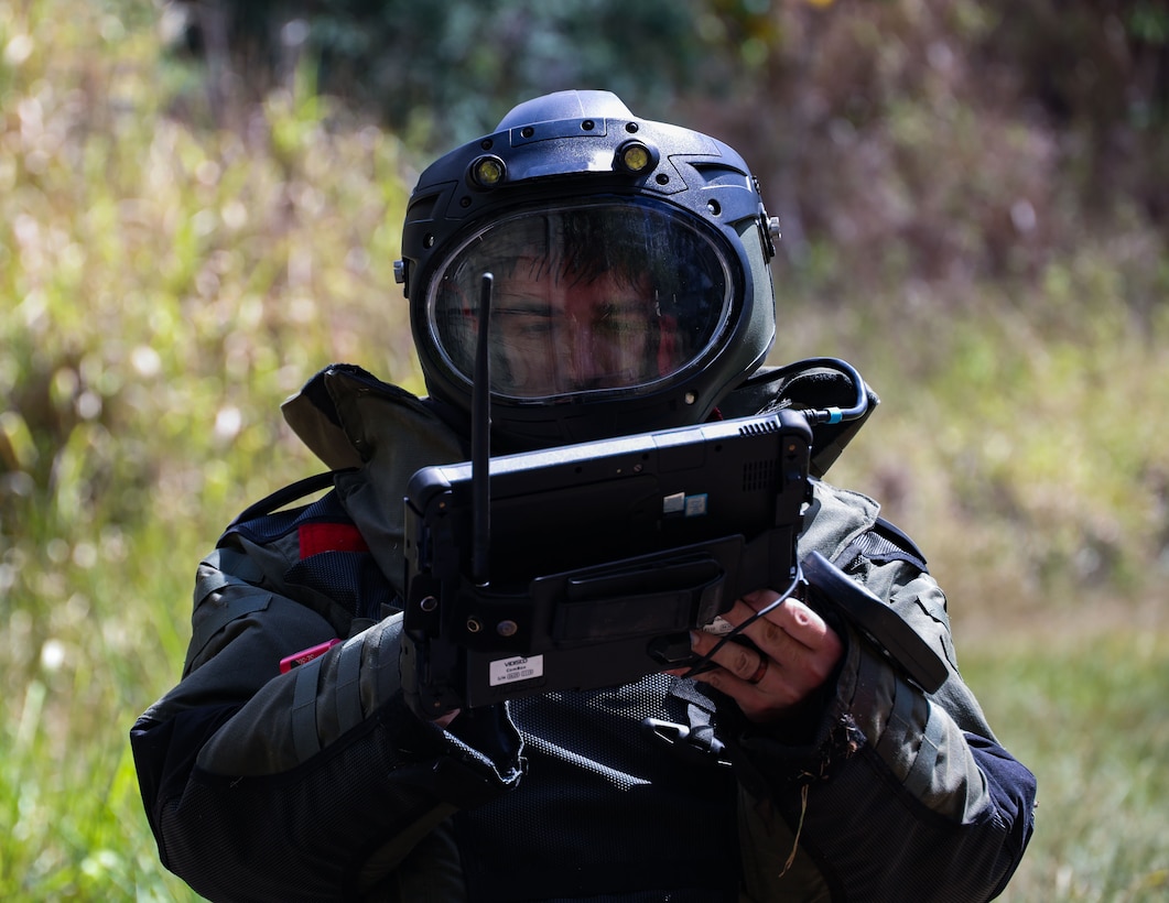 U.S. Marine Corps Staff Sgt. Shawn R. Gleason, an explosive ordnance disposal technician (EOD) with Marine Wing Support Squadron 174, Marine Aircraft Group 24, 1st Marine Aircraft Wing takes an X-ray of an improvised explosive device (IED) during a joint EOD range at Schofield Barracks, Hawaii, July 24, 2025. This joint training ensured service members maintained proficiency in continental United States style EOD operations and readiness to respond to conventional ordnance, suspicious packages, and IED threats. (U.S. Marine Corps photo by Cpl. Anabelle Reed-O’Brien)