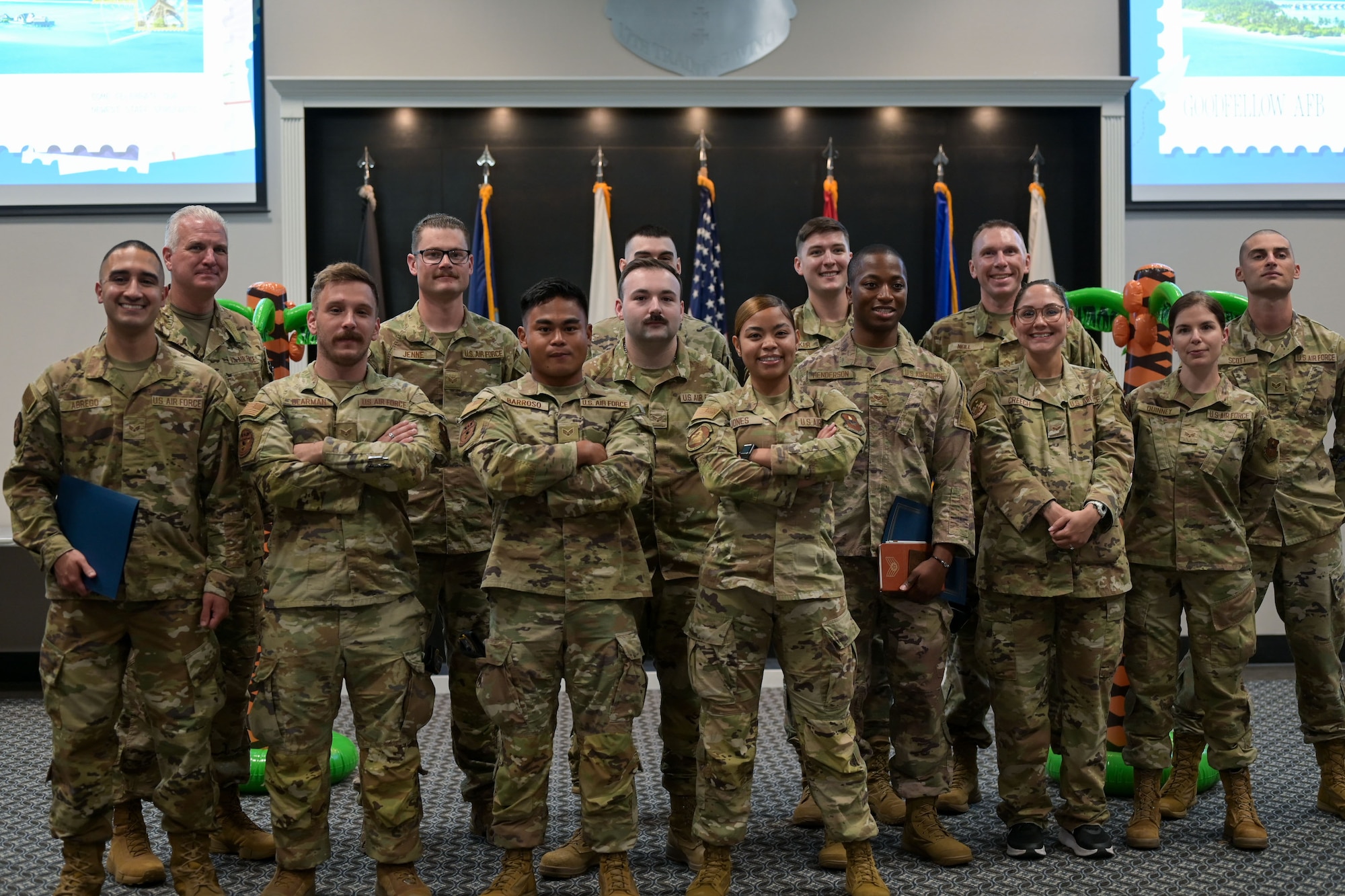 U.S. Air Force senior airmen assigned to Goodfellow pose for a group photo during the 25E5 Staff Sergeant Release Party at the Powell Event Center, Goodfellow Air Force Base, Texas, Aug. 18, 2025. It is common for selects to celebrate together as they progress through their Air Force careers. (U.S. Air Force photo by Senior Airman Evelyn J. D’Errico)