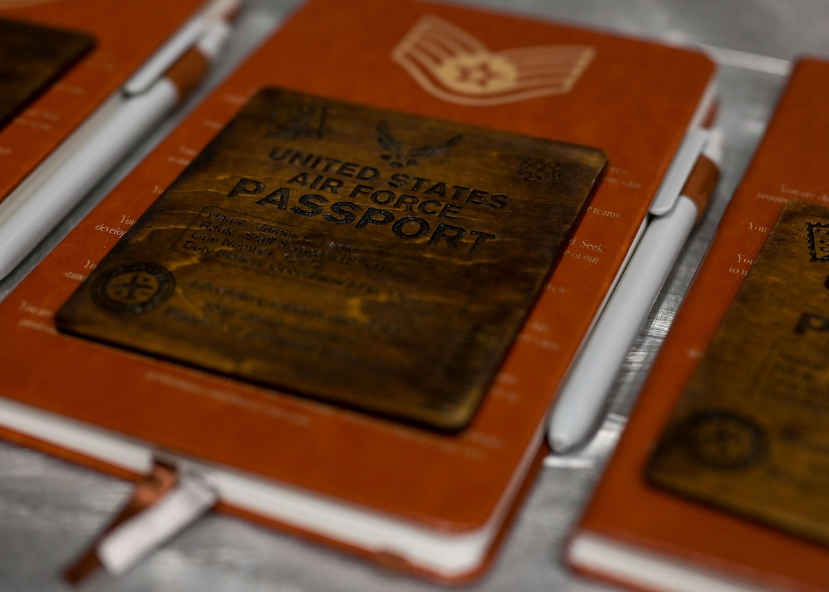 U.S. Air Force staff sergeant mementos sit on a table during the 25E5 Staff Sergeant Release Party at the Powell Event Center, Goodfellow Air Force Base, Texas, Aug. 18, 2025. Air Force officials selected 15,894 senior airmen for promotion to staff sergeant out of 47,007 eligible for a selection rate of 33.81 percent in the 25E5 promotion cycle. The 17th Training Wing had 32 selectees across the wing. (U.S. Air Force photo by Senior Airman Evelyn J. D’Errico)