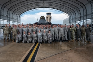 Group poses for a photo.