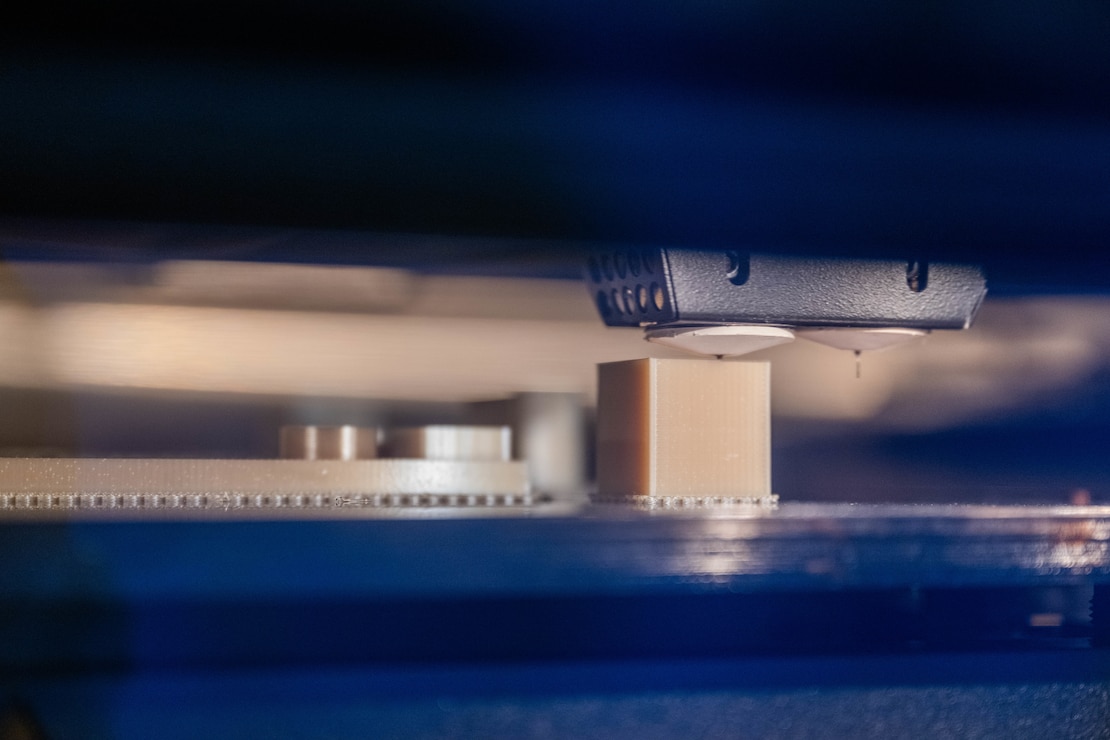 A 3D printer prints a tool in the 15th Maintenance Squadron's metal technologies shop on Joint Base Pearl Harbor-Hickam, Hawaii.