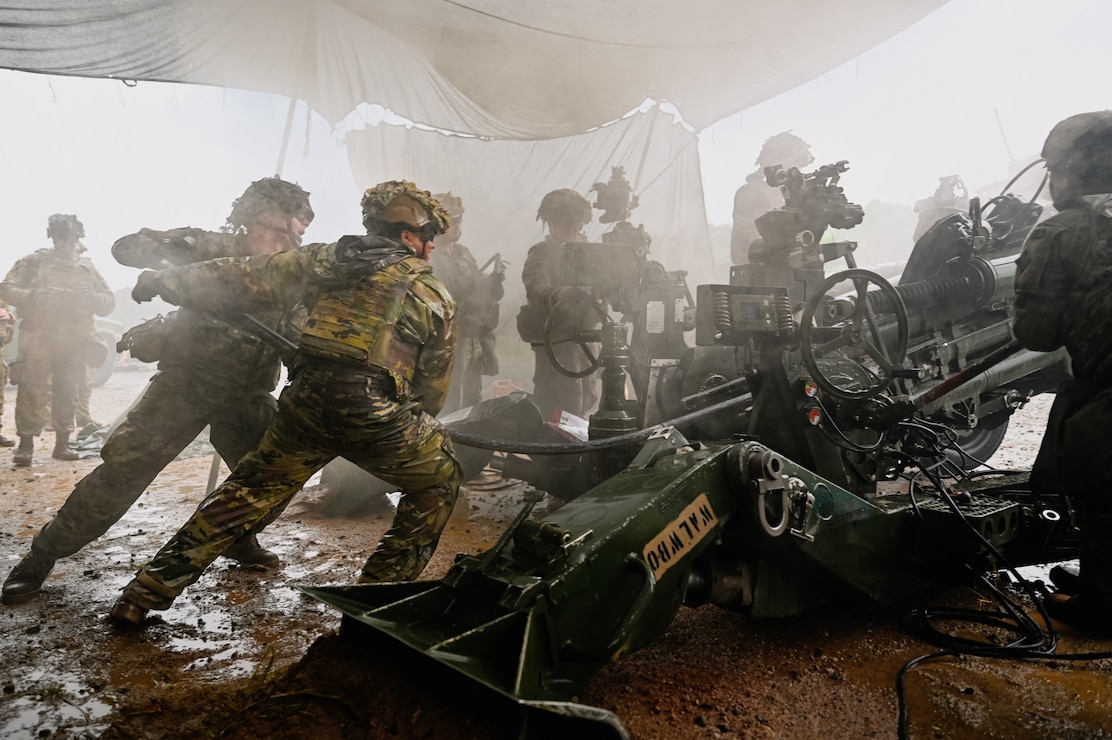 Artillery crews from 2-12 FA coordinate to reload an M777 howitzer during Table VI qualification at Rodriguez Live Fire Complex, South Korea, Aug. 13, 2025.