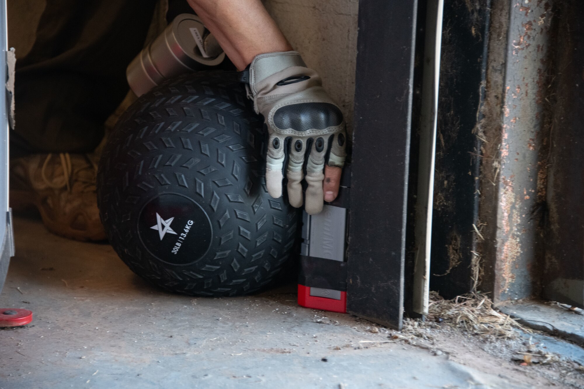 person places a training aid down