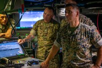 Col. Gabriel L. Diana, 3rd Marine Littoral Regiment commanding officer, right, and staff tour the Virginia-class fast-attack submarine USS Vermont (SSN 792) on Joint Base Pearl Harbor-Hickam, Aug. 14, 2025.