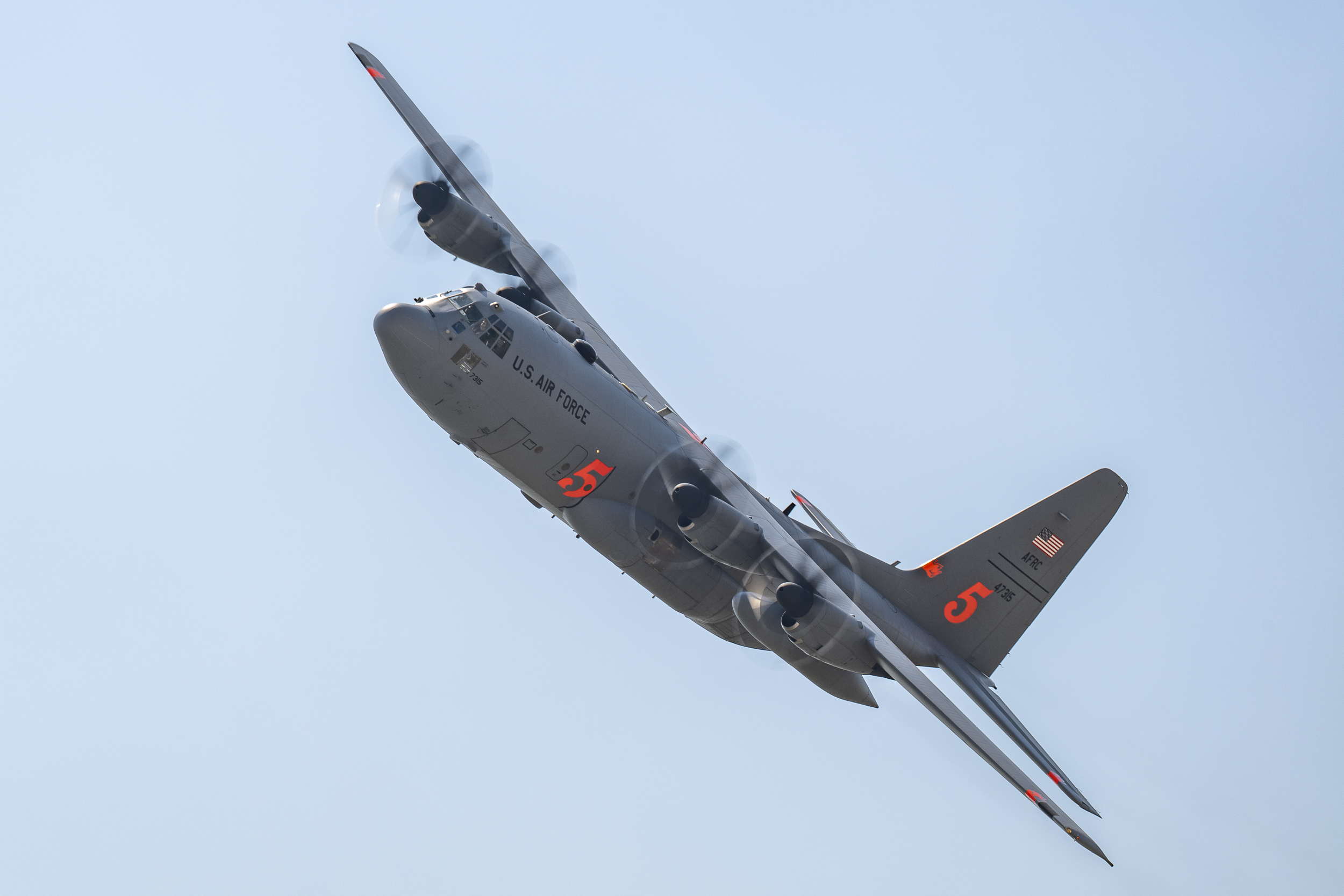 A military cargo aircraft in flight.