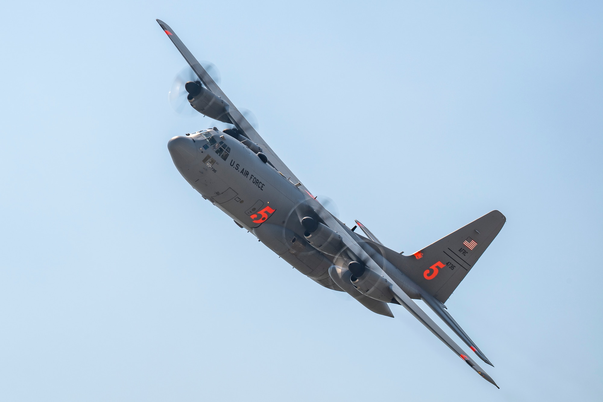 A military cargo aircraft in flight.