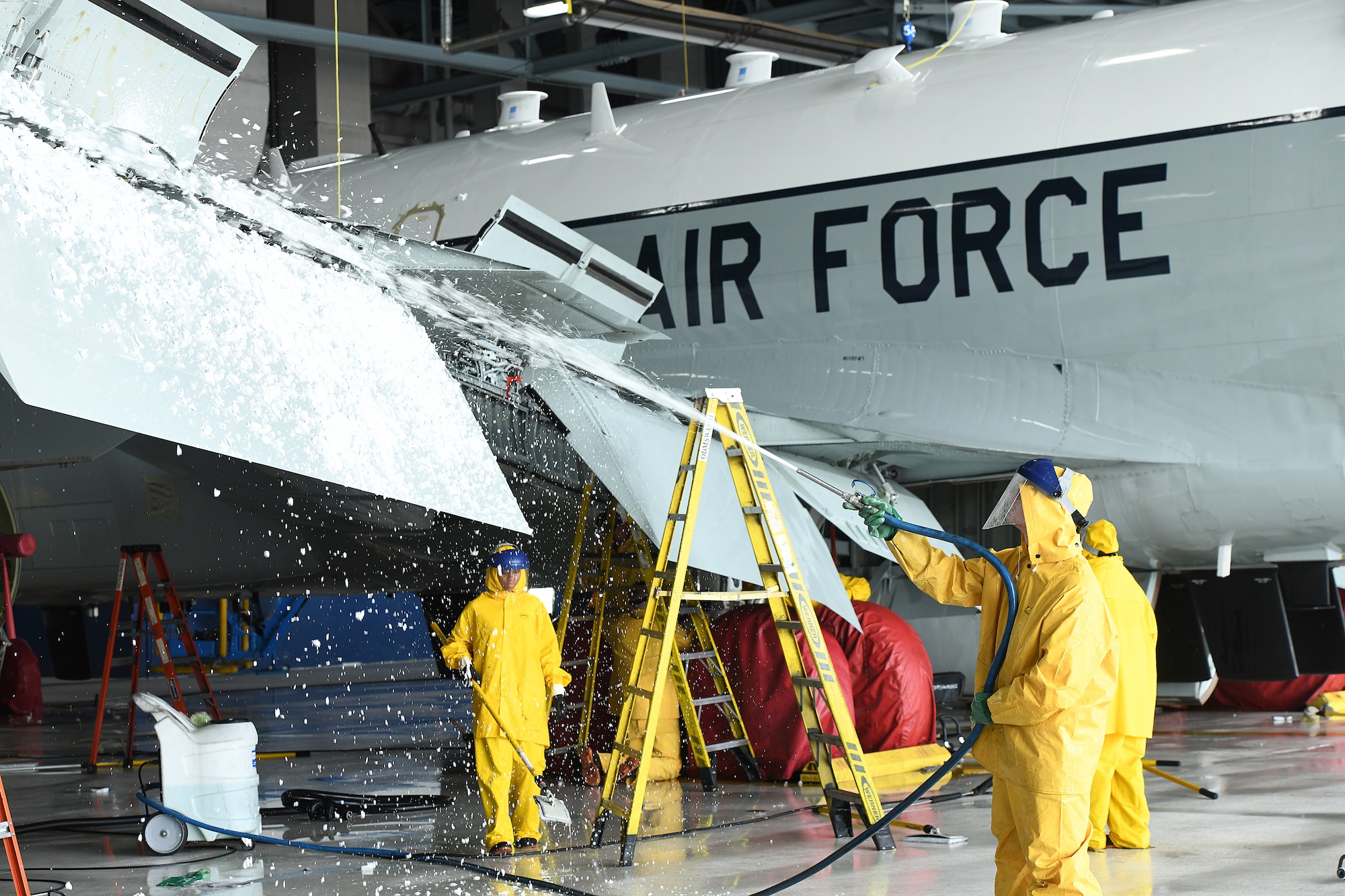 Offutt Airmen washes aircraft for safety.