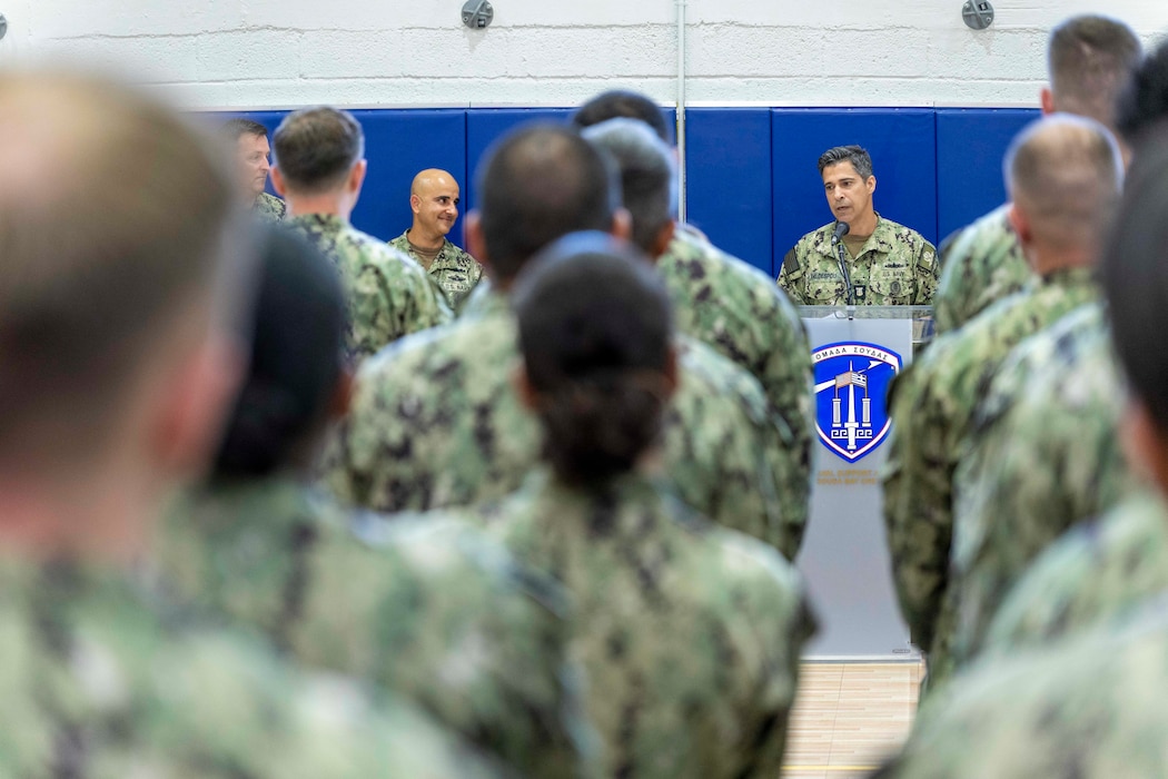 Incoming Command Master Chief Jans Valdespou, Naval Support Activity (NSA) Souda Bay, addresses Sailors assigned to Naval Support Activity (NSA) Souda Bay, during a Change of Command ceremony on Aug. 5, 2025.