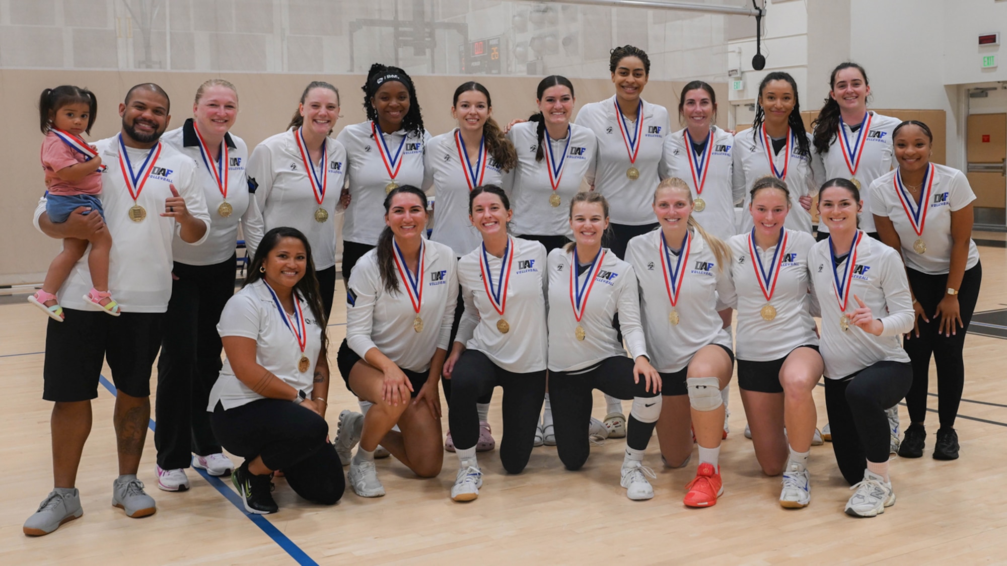 The Department of the Air Force women’s volleyball team poses for a photo after winning gold at the 2025 Armed Forces Volleyball Championship, held July 20-24 at Naval Station Mayport, Florida. The DAF women’s volleyball team rallied after a single loss to the U.S. Army team, winning their next four matches to claim the title. (Courtesy photo)
