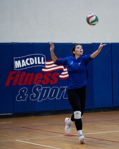 U.S. Air Force 2nd Lt. Jaqueline Gonzales-Brown, 6th Maintenance Squadron fabrication flight commander, serves during a practice with MacDill’s Hurricane Varsity Volleyball team at MacDill Air Force Base, Florida, Aug. 13, 2025. The members of the team helped guide and support Gonzales-Brown’s journey of joining the 2025 Department of the Air Force women’s volleyball team. (U.S. Air Force photo by Airman 1st Class Helen Ly)