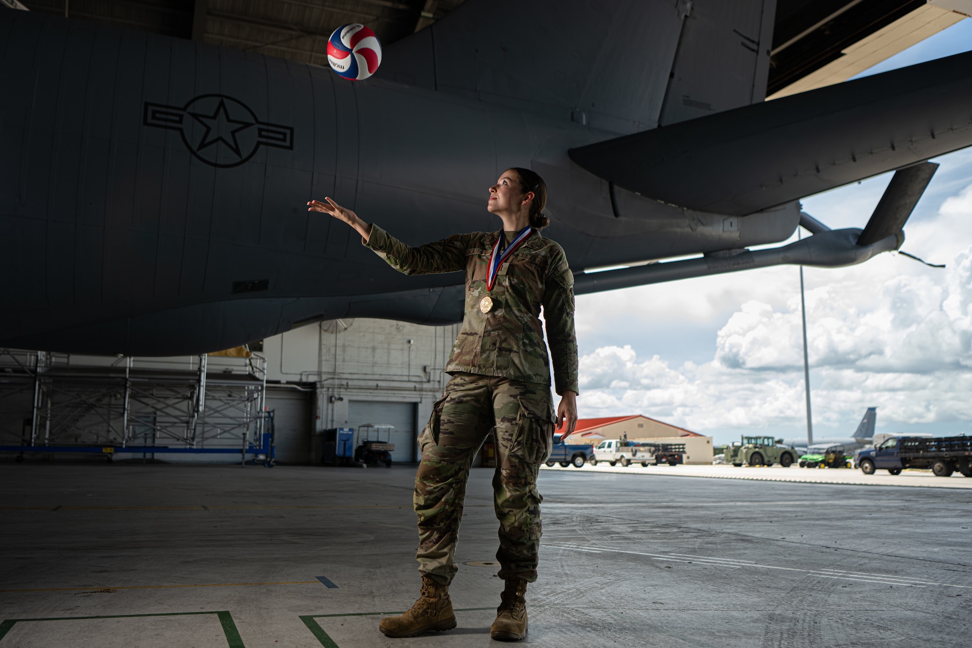 U.S. Air Force 2nd Lt. Jaqueline Gonzales-Brown, 6th Maintenance Squadron fabrication flight commander, poses in front of a KC-135 Stratotanker aircraft at MacDill Air Force Base, Florida, Aug. 13, 2025. Gonzales-Brown earned a spot on the 2025 Department of the Air Force women’s volleyball team and helped win gold at the Armed Forces Volleyball Championship at Naval Station Mayport, Florida, July 20-24, 2025. (U.S. Air Force photo by Airman 1st Class Helen Ly)