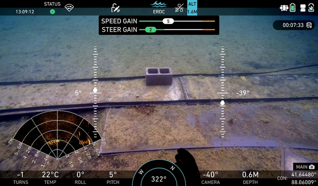 The underwater rover’s command screen provides critical information of its’ surroundings using a series of high-resolution cameras and high-fidelity sensors.