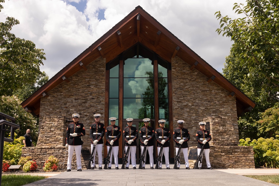 A U.S. Marine Corps firing party stands in front of the Semper Fidelis Memorial Chapel after providing a three Volley Salute during a memorial service for Team Rush Act and Marine Medium Helicopter Squadron 263, 1st Reconnaissance Battalion, in Triangle, Virginia, Aug. 14, 2025. Fourteen Marines and a Navy Corpsman were killed on Nov. 18, 1970, when their helicopter crashed into the side of a mountain in Vietnam during an emergency extraction. (U.S. Marine Corps photo by Lance Cpl. David Brandes)