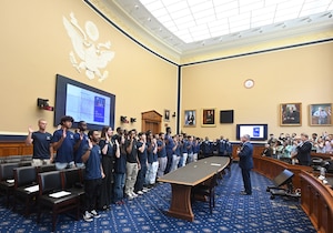 Brig. Gen. Craig McPike, Air Force Recruiting Service deputy commander, hosts a swearing-in ceremony for members of the Delayed Entry Program.