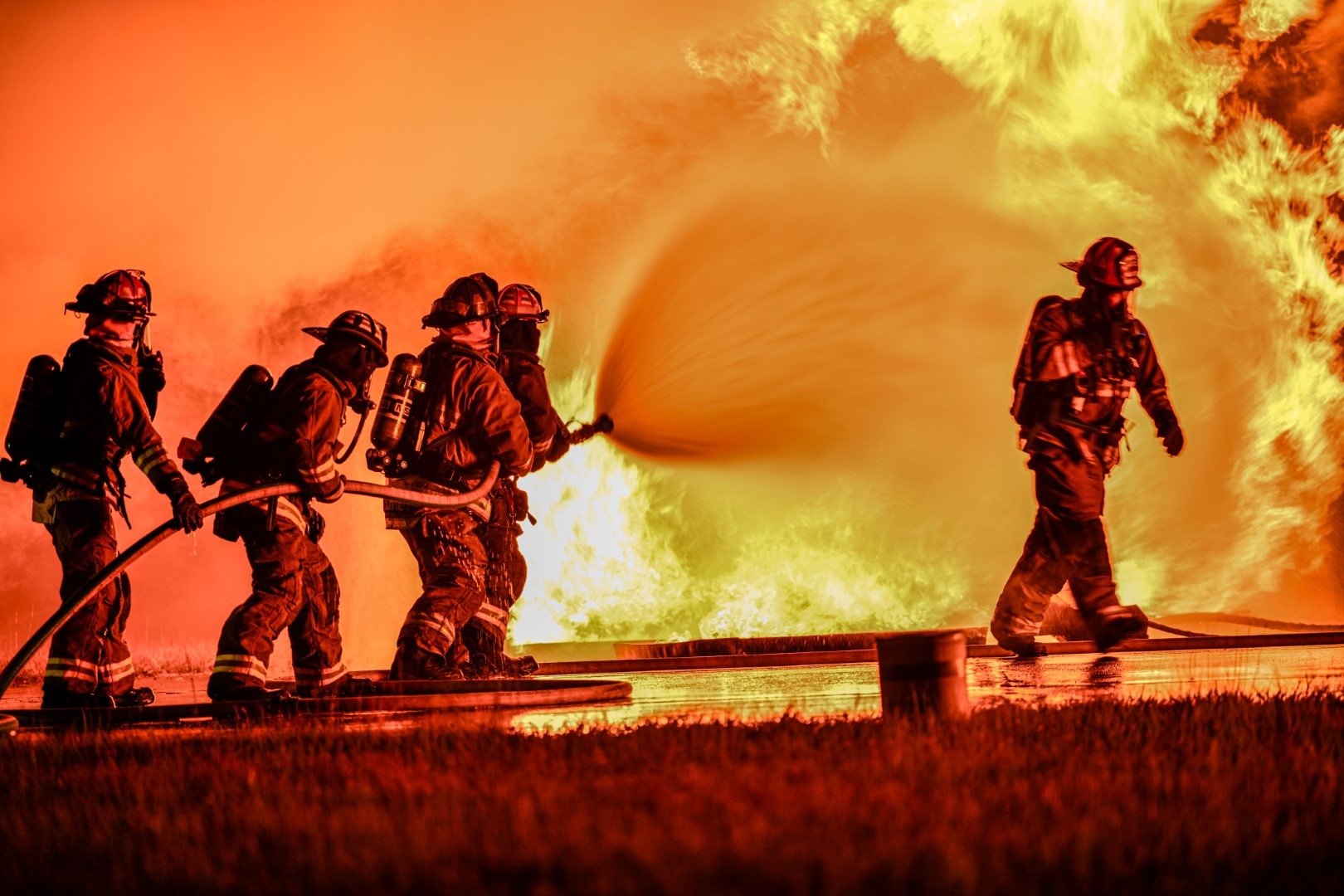 U.S. Army National Guard firefighters of the 1049th Engineer Detachment, Montana Army National Guard, respond to a nighttime fire training scenario during Northern Strike 25-2 at Grayling Army Airfield, Michigan, Aug. 4, 2025.