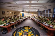 U.S. Army Sgt. Maj. of the Army Michael Weimer, center, speaks to Programa Integral para Suboficiales de Alta Jerarquía (PISAJ) 21 participants and facilitators from the U.S. and Colombian militaries about the roles and responsibilities of senior enlisted leaders at the U.S. Army Sergeants Major Academy at Fort Bliss, Texas, Aug. 18, 2025. PISAJ is a biannual, partner nation-funded initiative aligned with U.S. Southern Command’s Theater Campaign Plan and directly supports the Colombian army’s transformation to align its noncommissioned officer corps with globally recognized standards. (U.S. Army photo by Staff Sgt. Joshua Taeckens)