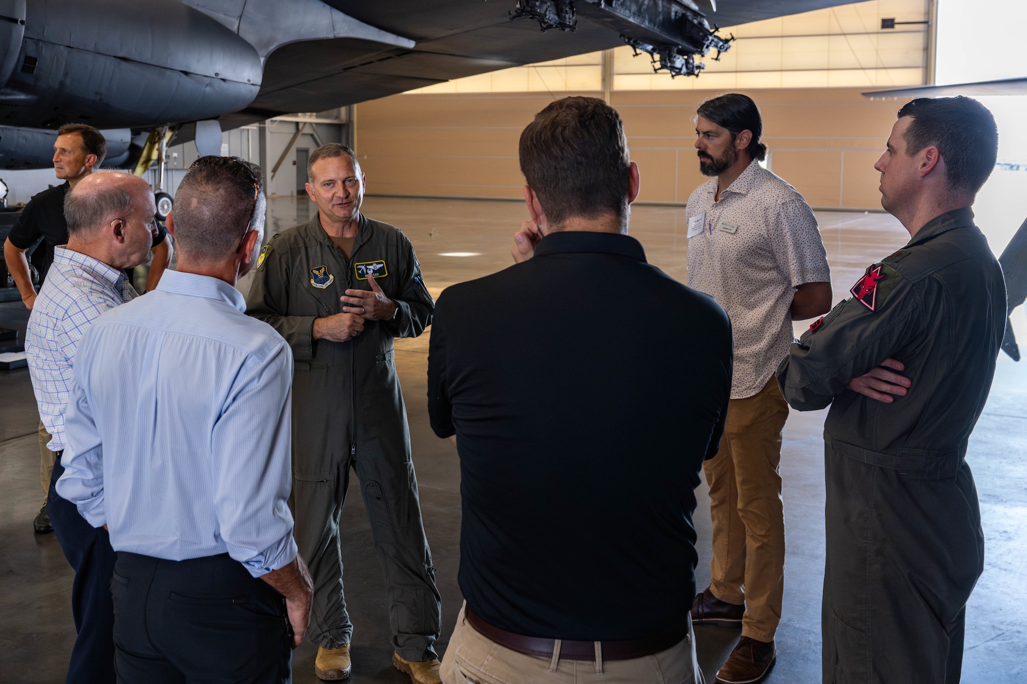 U.S. Air Force Col. Chris Cain, 2nd Bomb Wing commander, talks with honorary commanders