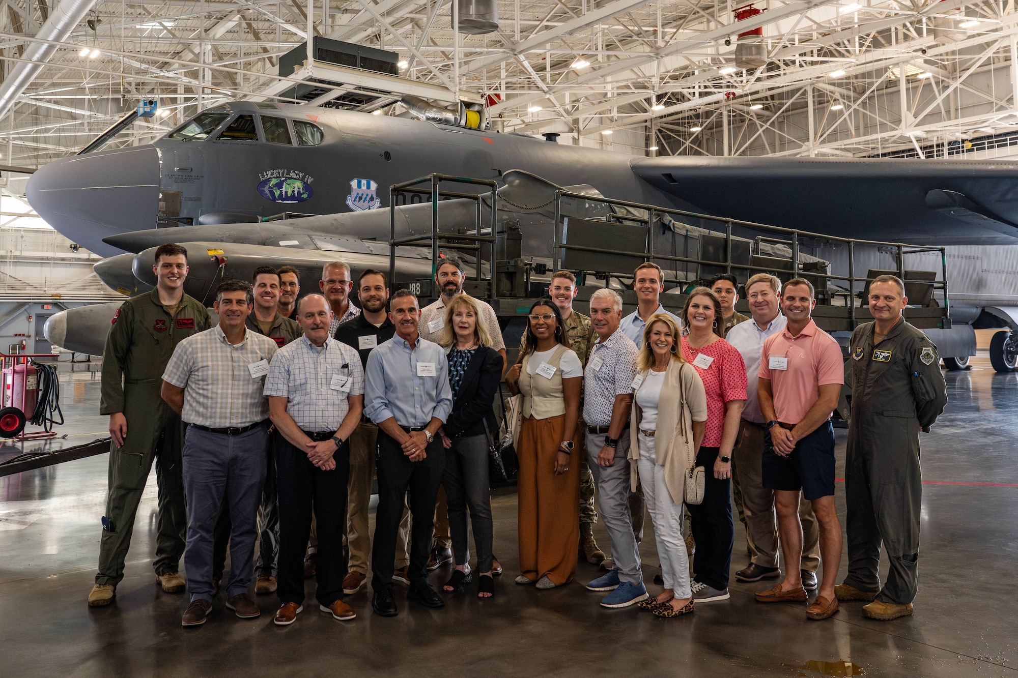 Honorary commanders and Airmen from the 2nd Bomb Wing stand for a group photo