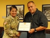 U.S. Army Reserve Ambassador Jeffrey Morton of Maine receives the Patriotic Public Service Award July 17 during an annual training workshop held at 99th Readiness Division headquarters on Joint Base McGuire-Dix-Lakehurst, New Jersey. The award was presented by Maj. Gen. Kris A. Belanger, former 99th RD commanding general. (U.S. Army photo by Mr. Sal Ottaviano, 99th RD Public Affairs)