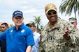 U.S. Navy Admiral Alvin Holsey, the commander of U.S Southern Command (USSOUTHCOM), speaks with Frank Abrego, the Minister of Public Security of Panama at Aeronaval Base Cristóbal Colón, Aug. 17, 2025. Holsey and Abrego visited a jungle orientation course, observing U.S. Marines being taught jungle survival skills from a combined instructor team of U.S. Army and Panamanian security institution members. (U.S. Air Force photo by Capt. Jymil Licorish)