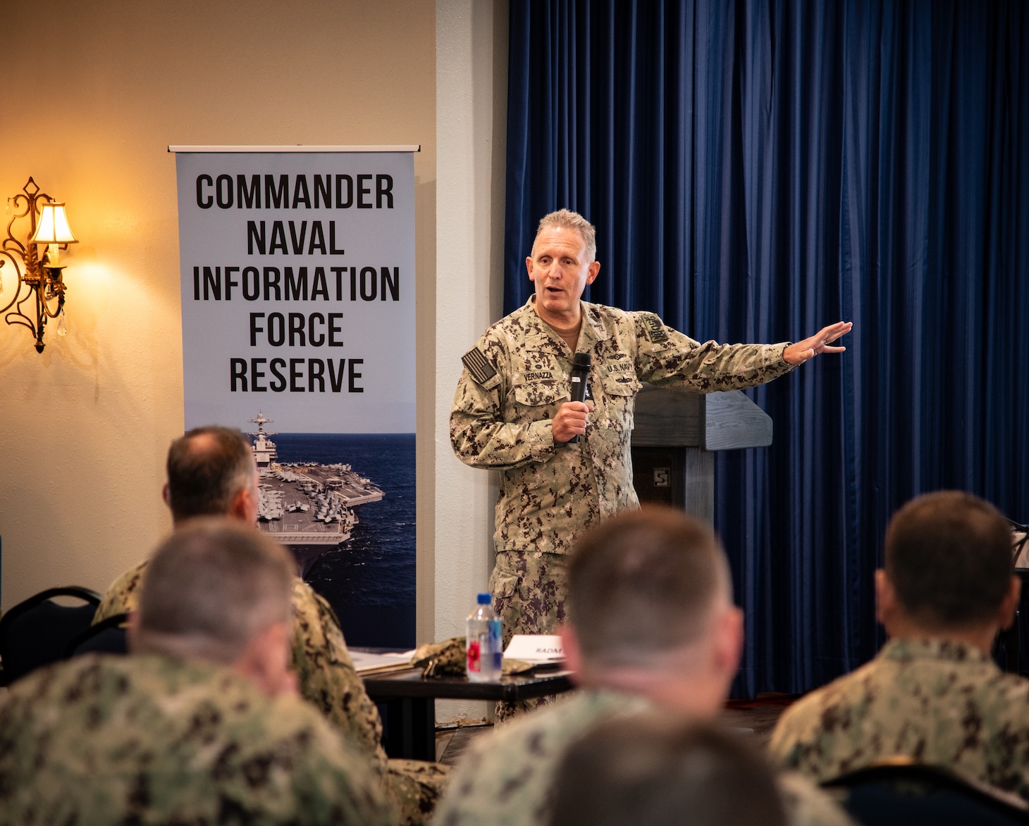 Vice Adm. Mike Vernazza, Commander, Naval Information Forces, provides a lecture as the keynote speaker at the 2025 Commander’s Conference at Naval Air Station Joint Reserve Base Fort Worth on June 8, 2025. The three-day event aimed to level-set leadership about the Information Warfare Operational Imperative to share valuable insights, communicate Commander's intent to senior leaders, and hone in on ongoing command initiatives to help operationalize CNIFR.