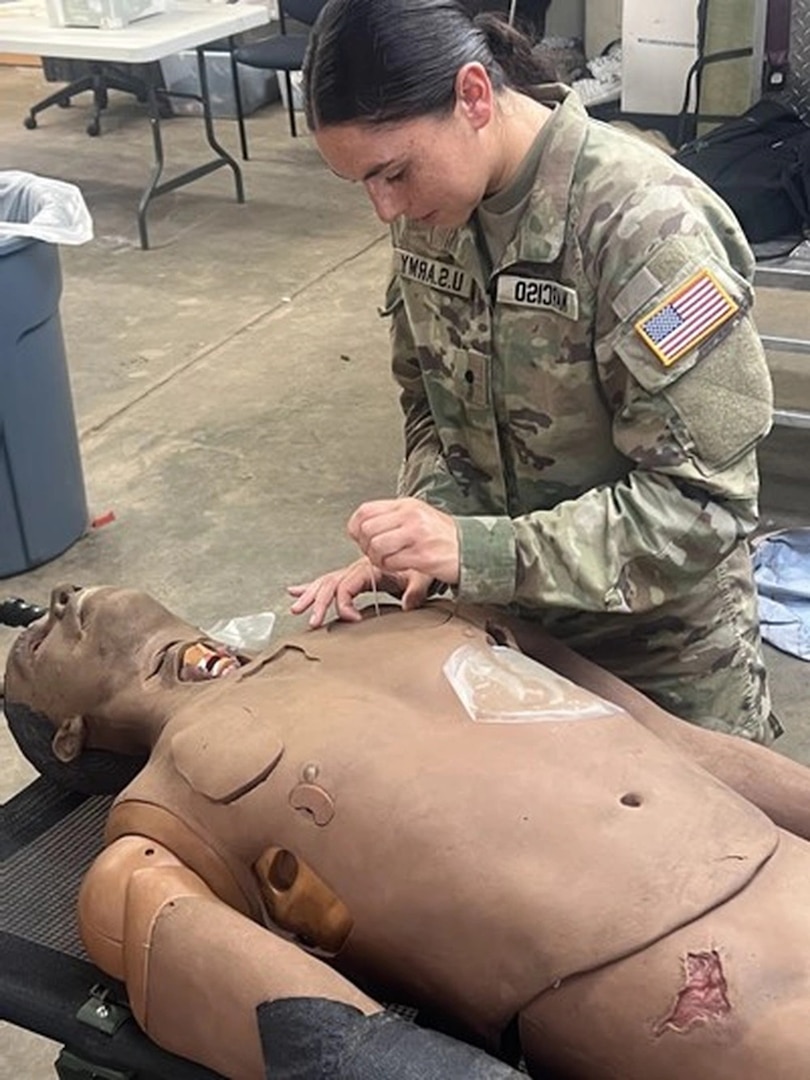 CDT Nicole Narciso conducting a needle decompression.