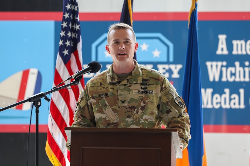 U.S. Army Col. Gabriel Spicer, commander of the 63rd Theater Aviation Brigade, speaks at the 110th anniversary of Kentucky Army National Guard aviation, held at the Army Aviation Support Facility on Boone National Guard Center in Frankfort, Kentucky, Aug. 15, 2025.