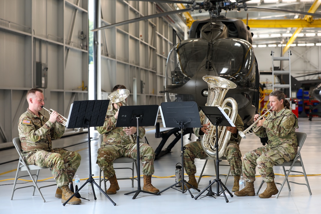 Soldiers of the 202nd Army Band perform at the 110th anniversary of Kentucky Army National Guard aviation, held at the Army Aviation Support Facility on Boone National Guard Center in Frankfort, Kentucky, Aug. 15, 2025.