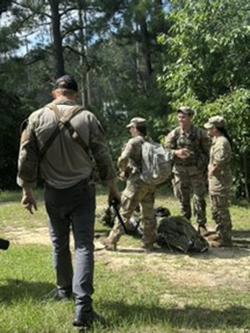 The Nurse Summer Training Program Cadets celebrate completing their Situational Training Exercise lane.