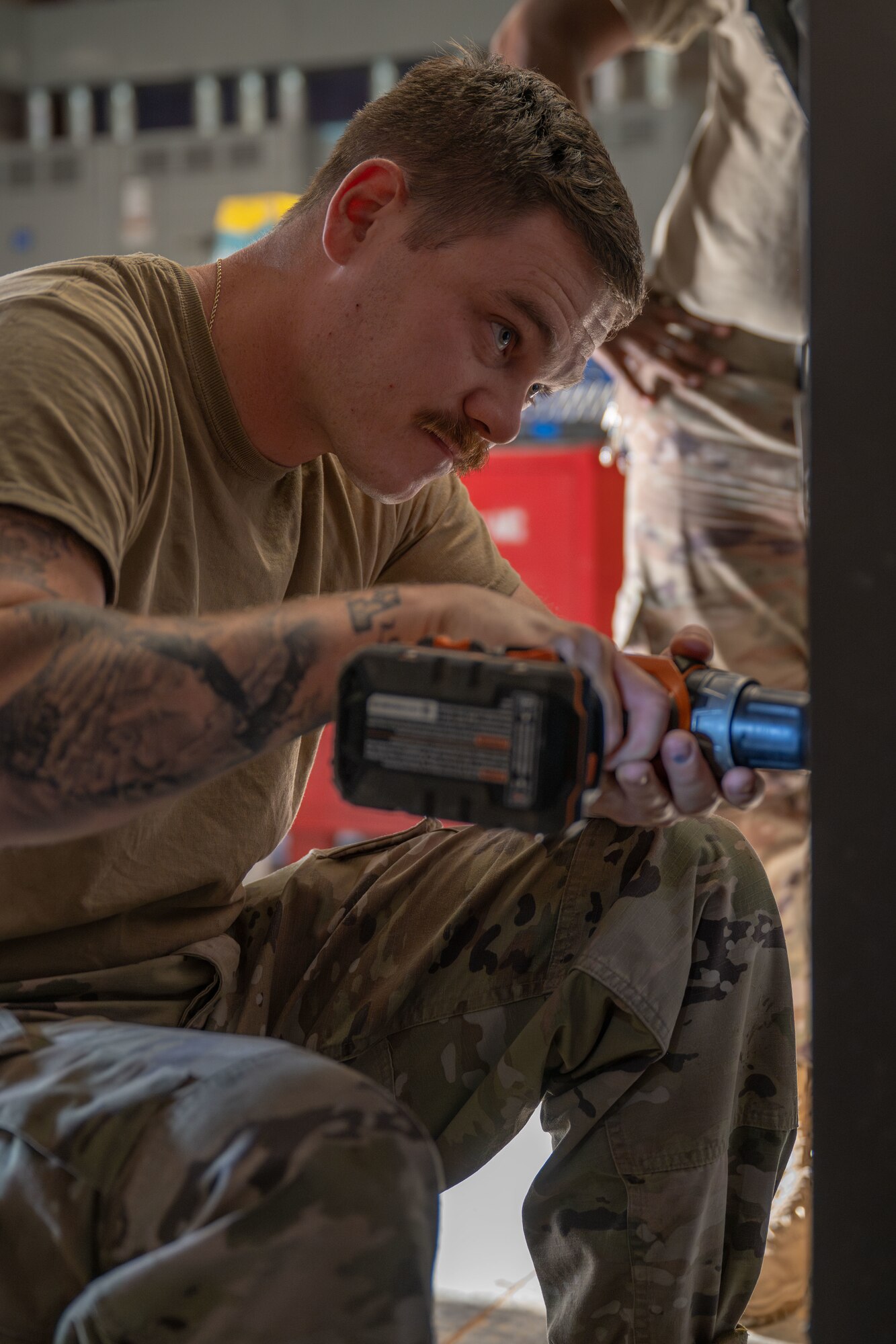 Staff Sgt. Daniell Blade, 22nd Civil Engineer Squadron heating, ventilation and air conditioning technician, performs maintenance on a boiler at McConnell Air Force Base, Kansas, Aug. 19, 2025. Once then maintenance was completed, Blade reassembled the boiler and performed operational testing. (U.S. Air Force photo by Airman 1st Class Paula Arce)