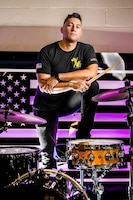 Soldier with a drum set.