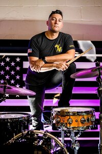 Soldier with a drum set.