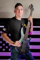 Soldier with a guitar.