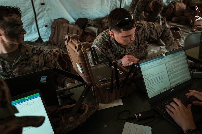 Marines use a 5G expeditionary transmission system during a field training exercise at Camp Lejeune, N.C.