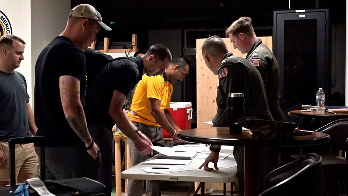 U.S. service members complete in-processing at Yokota Air Base, Japan, Aug. 18, 2025.