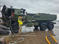 A HIMARS platform undergoes an Agricultural Wash during SABAK 25, as part of biosecurity protocols to prevent the transfer of foreign contaminants during redeployment. Thorough cleaning ensures both environmental compliance and equipment readiness.