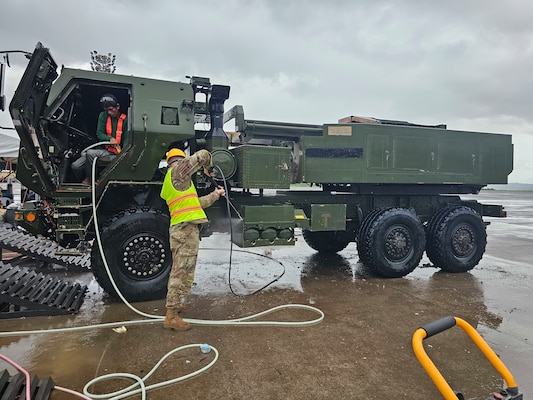 A HIMARS platform undergoes an Agricultural Wash during SABAK 25, as part of biosecurity protocols to prevent the transfer of foreign contaminants during redeployment. Thorough cleaning ensures both environmental compliance and equipment readiness.