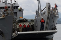 U.S. Army watercraft operators and Philippine Soldiers execute a roll-on/roll-off exercise during SABAK 25, showcasing seamless joint logistics and maritime coordination along the Philippine coast.