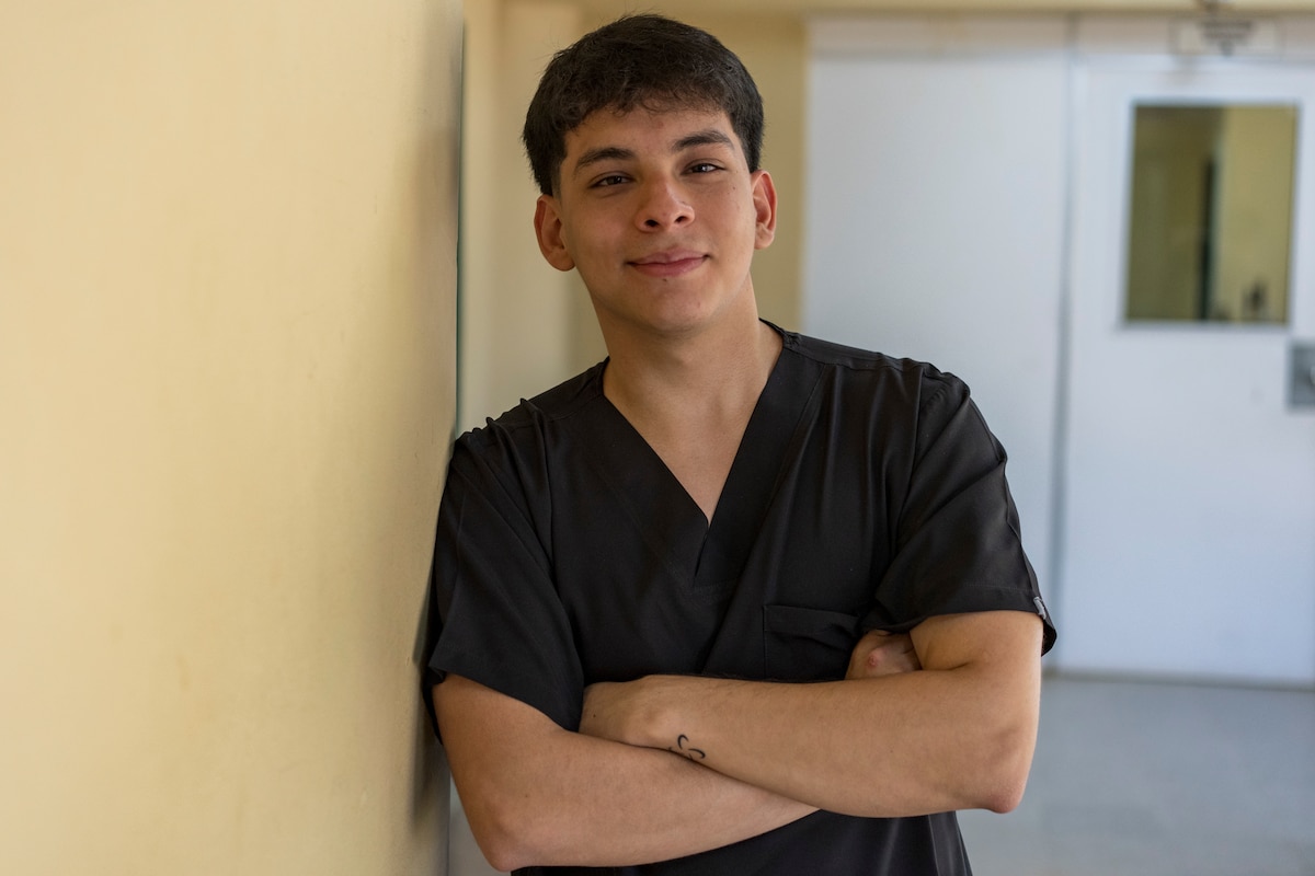 Nico Rodriguez, a Universidad Autónoma de Paraguay dental student and AMISTAD volunteer, poses for a photo at Hospital General de Luque, in Paraguay, Aug. 14, 2025. More than a dozen student and doctor volunteers supported U.S. and Paraguayan medical providers throughout the mission, bridging language and cultural gaps. (U.S. Air Force photo by Andrea Jenkins)